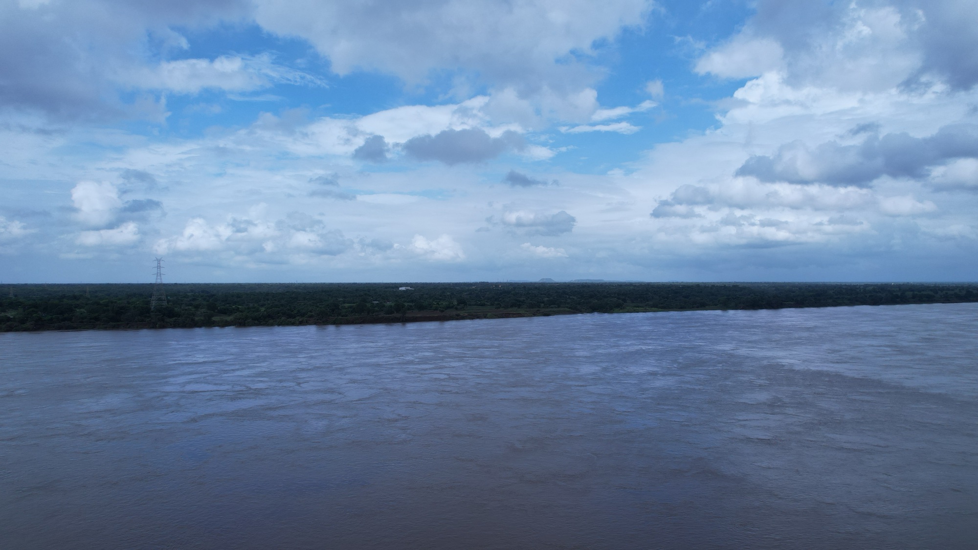 Clouds over the Narmada river at Poicha