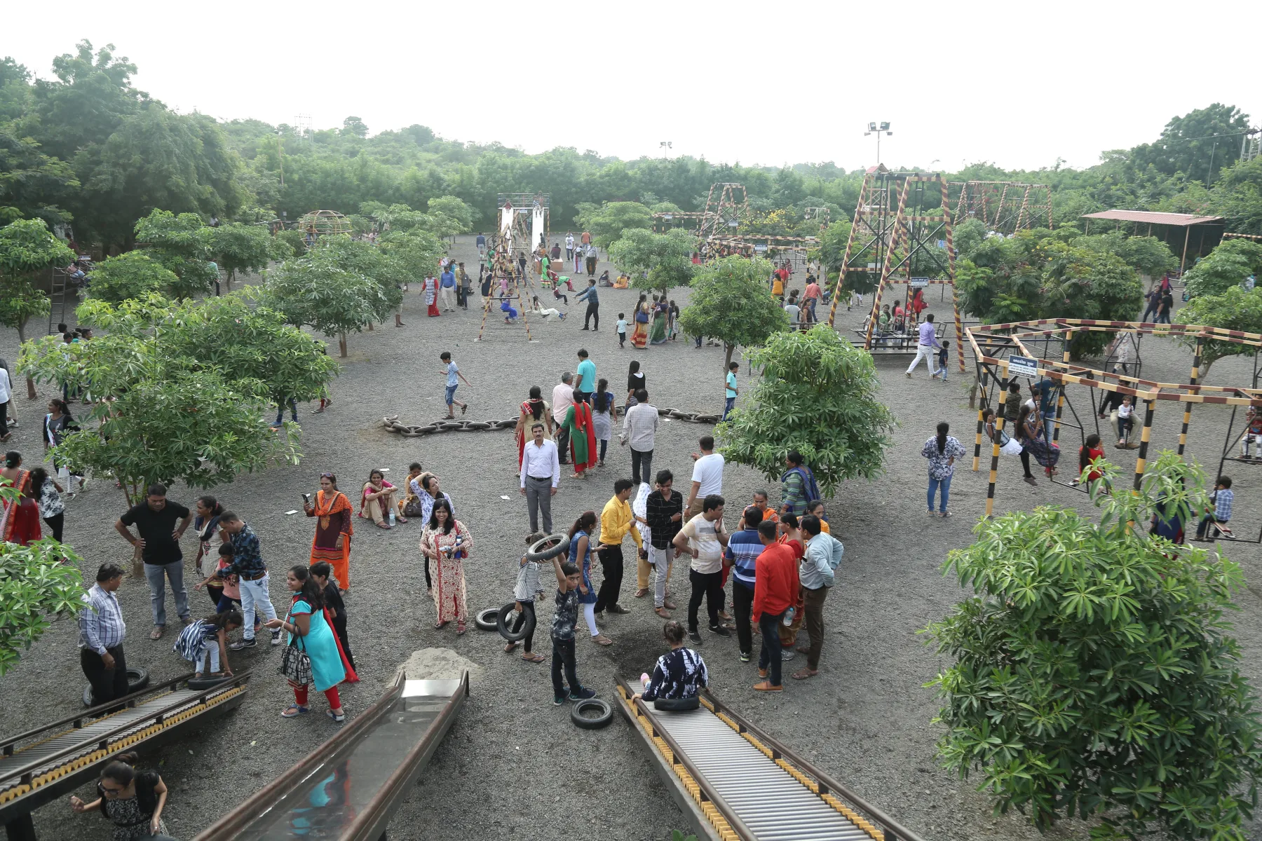 Families at Enjoy Park beside Sahajanand Pradarshani