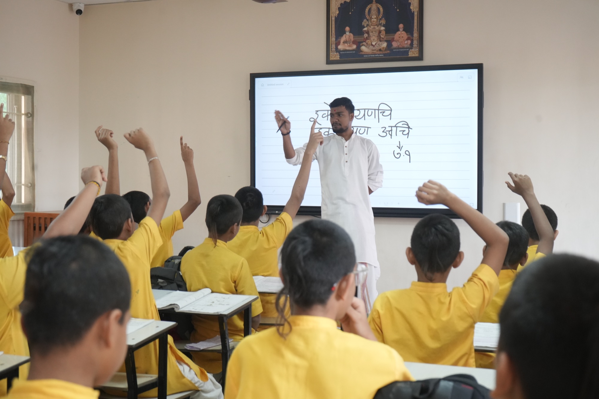 Students learning Sanskrit in a smart classroom at Shri Dharmajeevan Sanskrit Gurukul