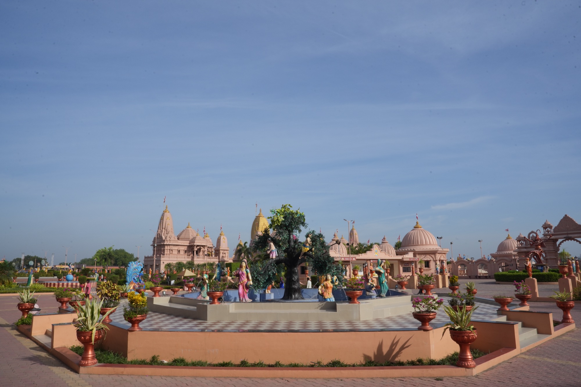 Garden filled with divine leela scenes